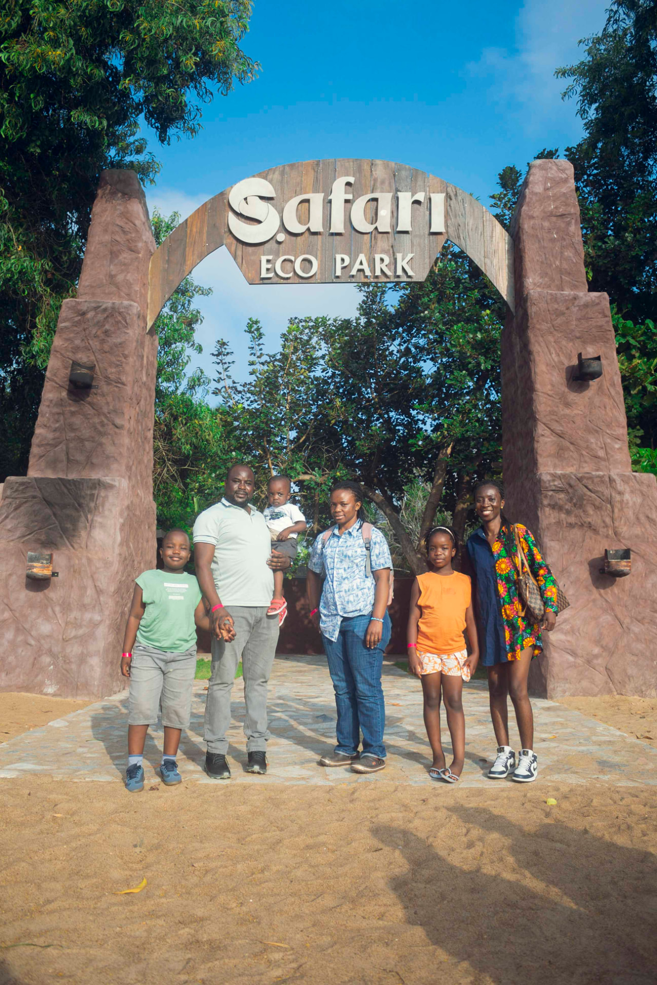 A family at the Safari Eco Park entrance